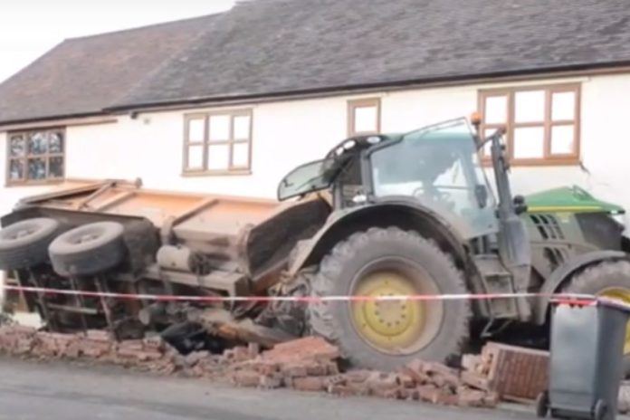 Tractor crashes into house